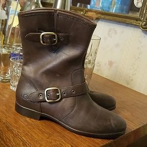 Ugg brown leather boots .